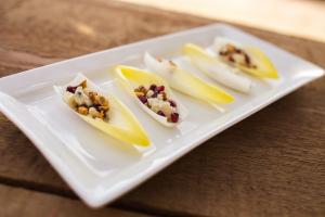 Pomegranates, Gorgonzola & Walnuts in Endive Pomegranates, Gorgonzola & Walnuts in Endive